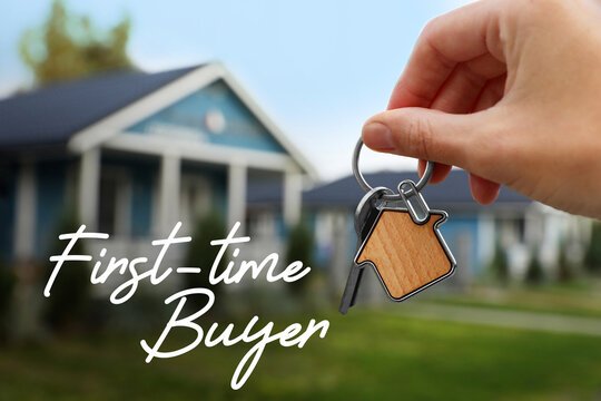 Couple holding keys to new home